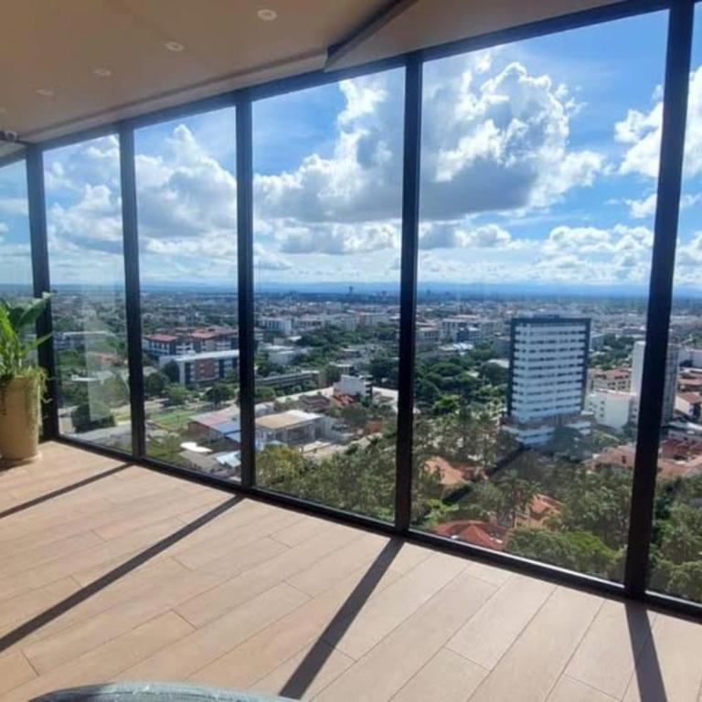 Balcon piso 16 - Escritorio - Piscina - Gym - One-Bedroom Apartment - 23