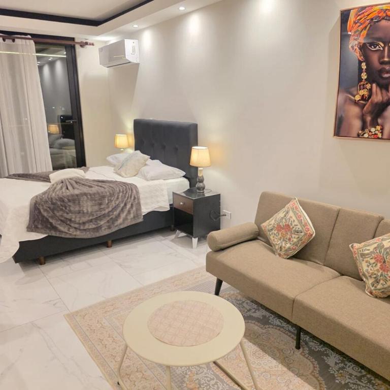 Balcon piso 16 - Escritorio - Piscina - Gym - One-Bedroom Apartment - 33