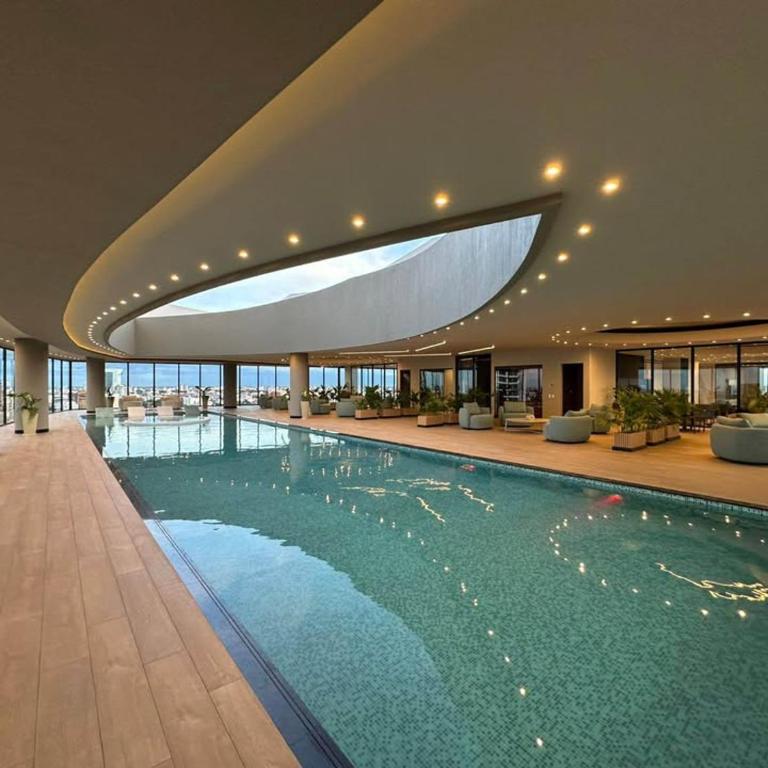 Balcon piso 16 - Escritorio - Piscina - Gym - One-Bedroom Apartment - 37