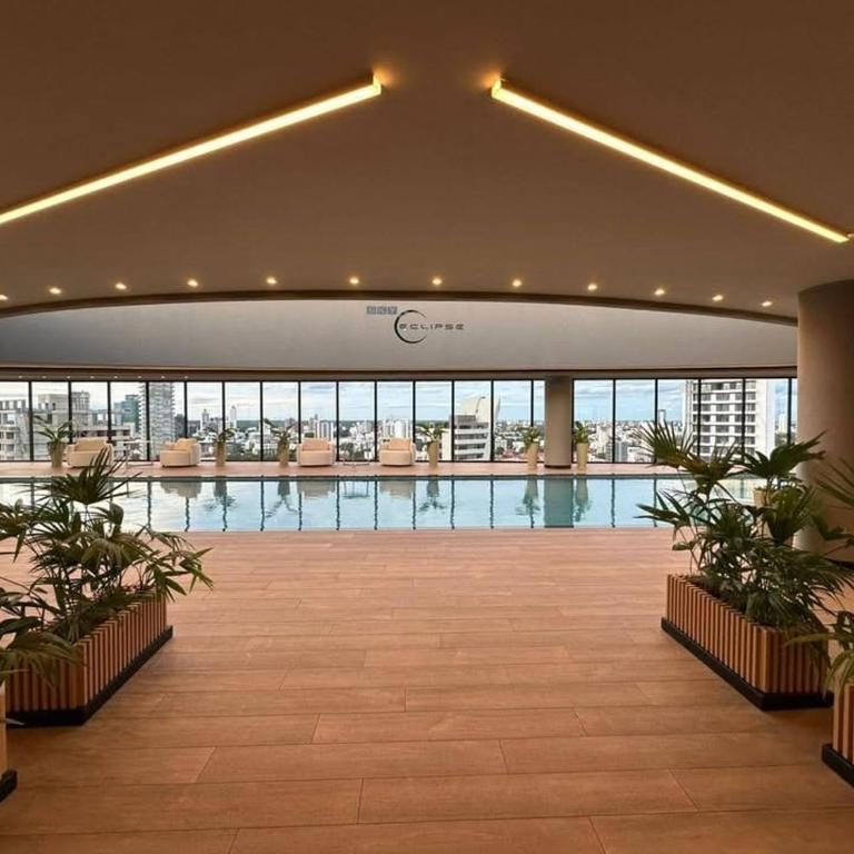 Balcon piso 16 - Escritorio - Piscina - Gym - One-Bedroom Apartment - 40