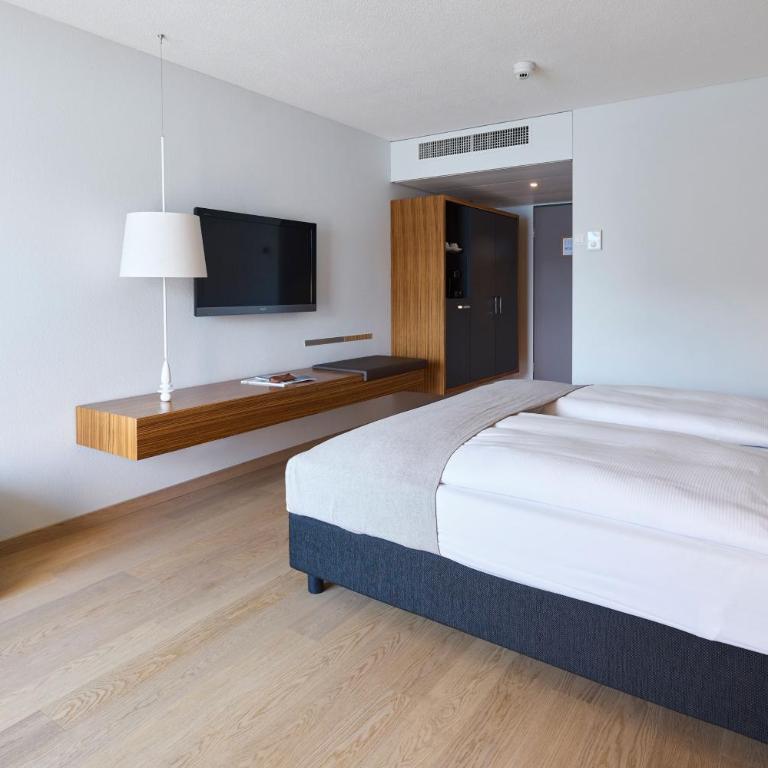 Seehotel Kastanienbaum - Doppelzimmer mit Balkon und Seeblick - 8