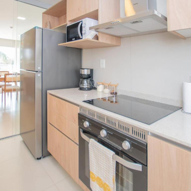 In the heart of Villamorra Rooftop Pool & BBQ - Apartment - 17