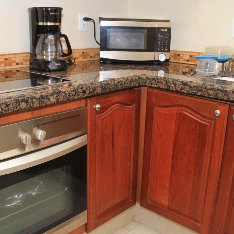 Ground floor Condo, Steps from Coco Beach and 5th Av - Apartment - 12