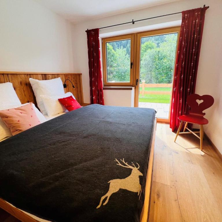 Sonnwies Chalet - Apartment mit 2 Schlafzimmern und Dusche - 14