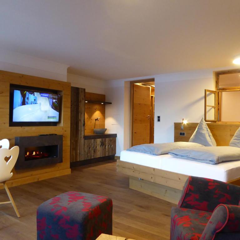 Dreimäderlhaus - Das vegetarische Boutique Hotel - Premium Familienzimmer mit Seeblick - 11