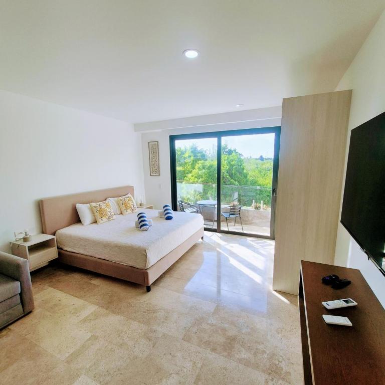 Nature view steps from the Caribbean Sea - Apartamento Estudio - 35