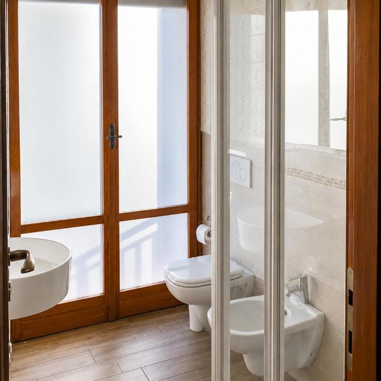 INDULGEO Home Barana - Camera Tripla con Bagno in Comune - 12