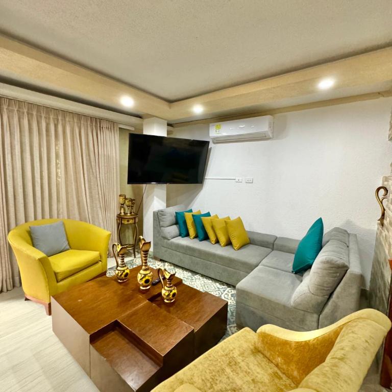 Condominio Vacacional frente al mar - Cabañas y Habitaciones - Three-Bedroom Villa - 1