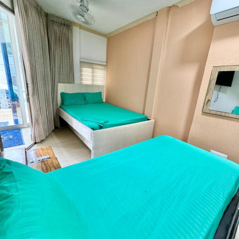 Condominio Vacacional frente al mar - Cabañas y Habitaciones - Three-Bedroom Vacation Home - 4