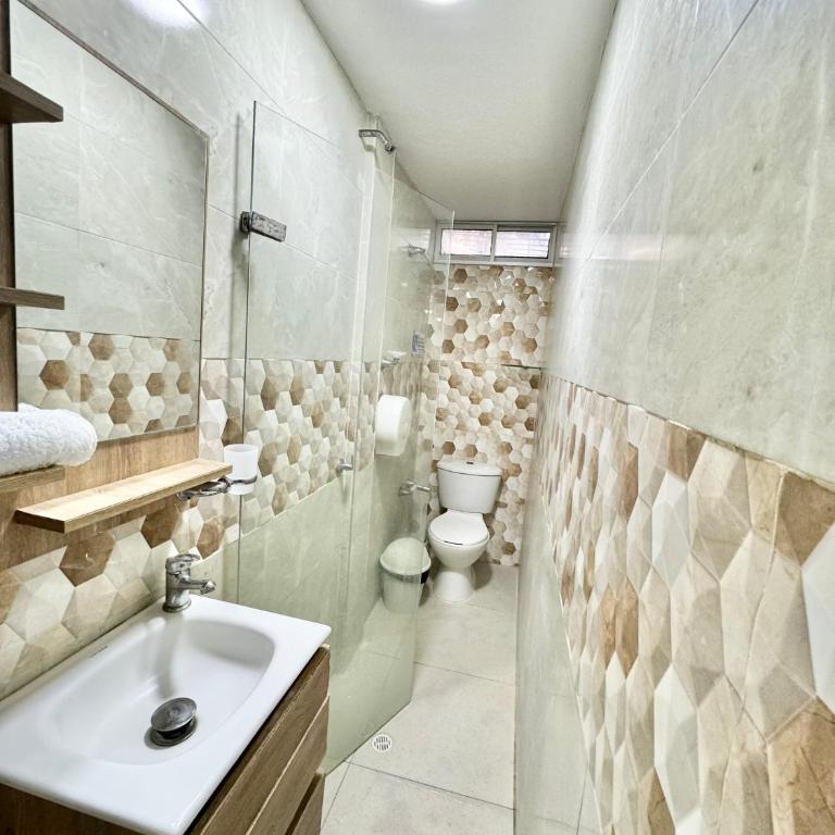 Condominio Vacacional frente al mar - Cabañas y Habitaciones - Three-Bedroom Vacation Home - 12