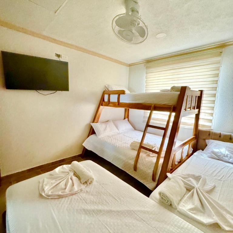 Condominio Vacacional frente al mar - Cabañas y Habitaciones - Two-Bedroom Deluxe Apartment with Balcony - 5