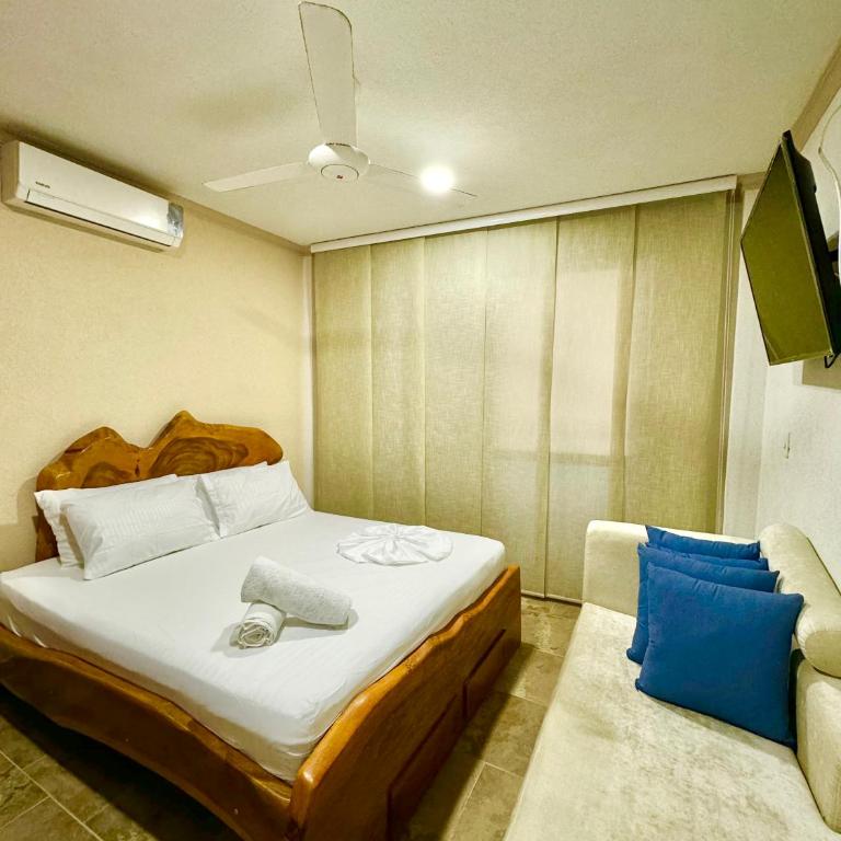 Condominio Vacacional frente al mar - Cabañas y Habitaciones - Two-Bedroom Deluxe Apartment with Balcony - 11