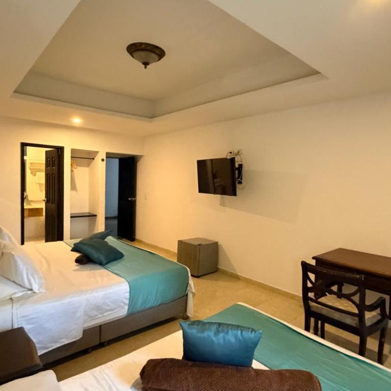 hotel turqueza inn - Habitación Cuádruple Confort - 5