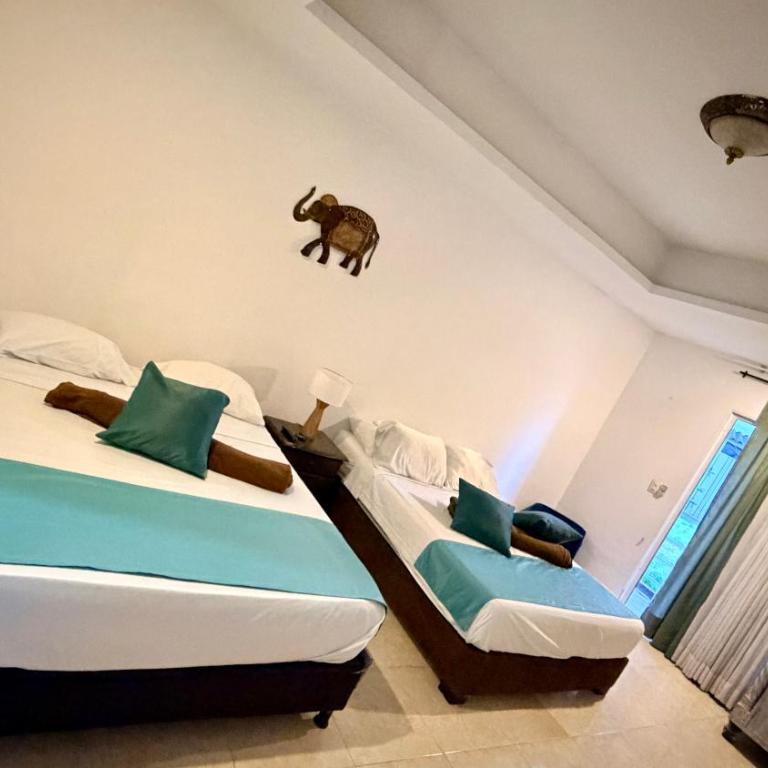hotel turqueza inn - Habitación Cuádruple Confort - 6