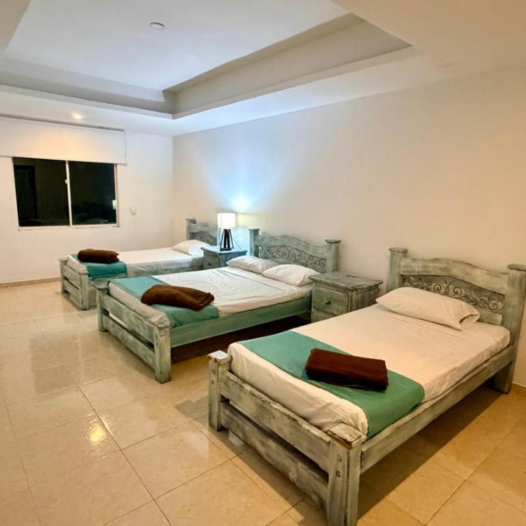 hotel turqueza inn - Habitación Cuádruple Estándar - 6