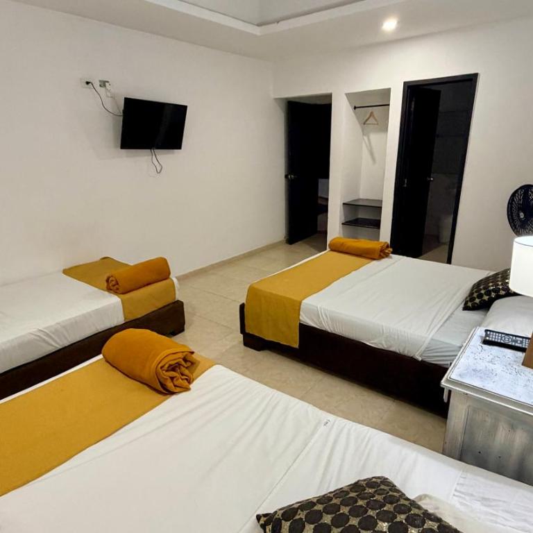 hotel turqueza inn - Habitación Triple Estándar - 4