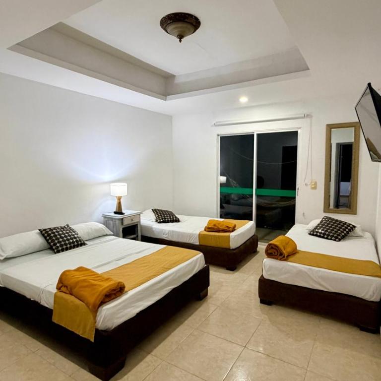 hotel turqueza inn - Habitación Triple Estándar - 5