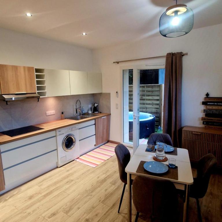 Studio cosy avec jacuzzi , sauna et salle de sport - Apartment mit Gartenblick - 1