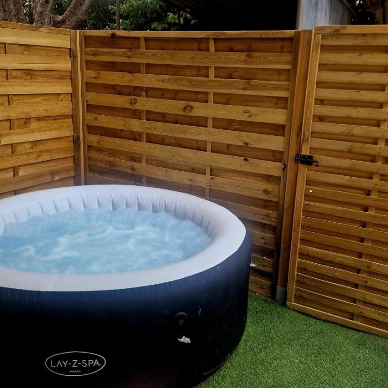 Studio cosy avec jacuzzi , sauna et salle de sport - Apartment mit Gartenblick - 13