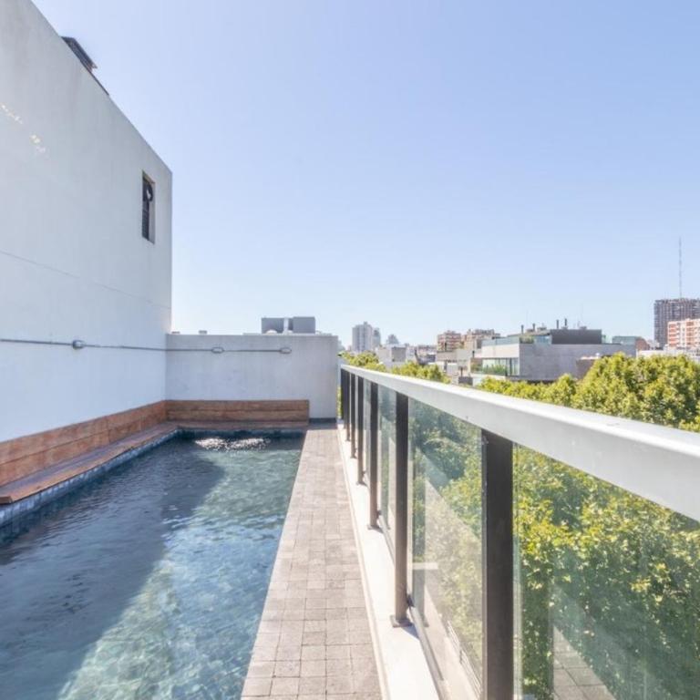 hermoso acogedor con cochera y parrilla - One-Bedroom Apartment - 35