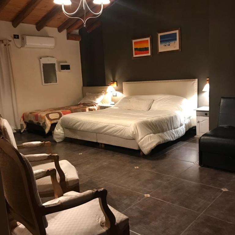 Posada La Ernestina Villa de las rosas - Triple Room with Garden View - 20
