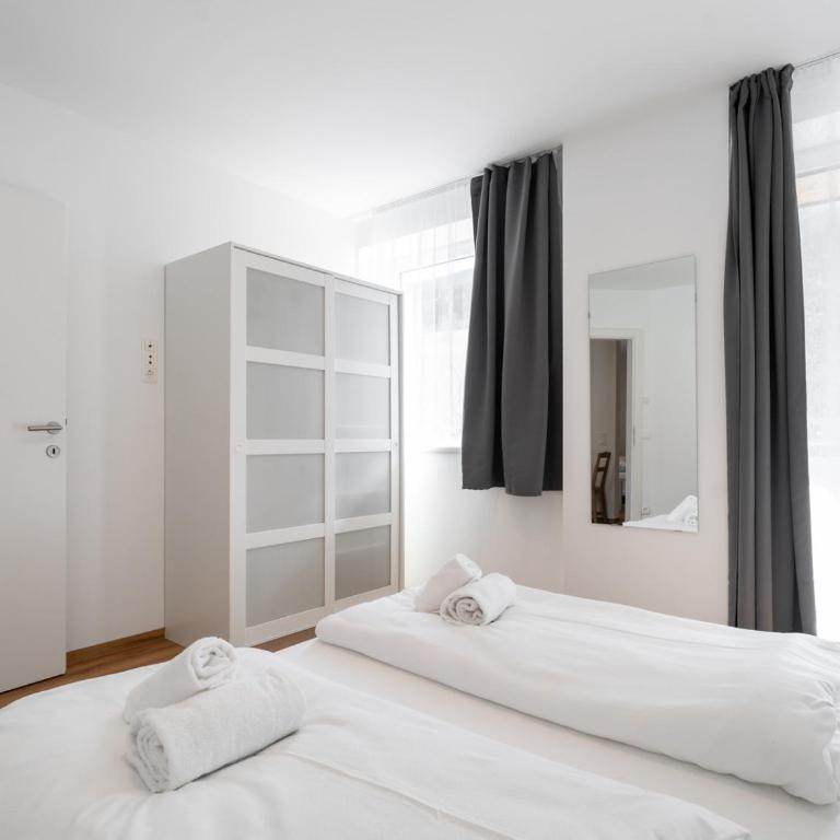 Haus3310 by we rent - Apartment mit 1 Schlafzimmer, Balkon und Bergblick - 11