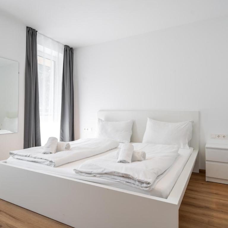 Haus3310 by we rent - Apartment mit 1 Schlafzimmer, Balkon und Bergblick - 10