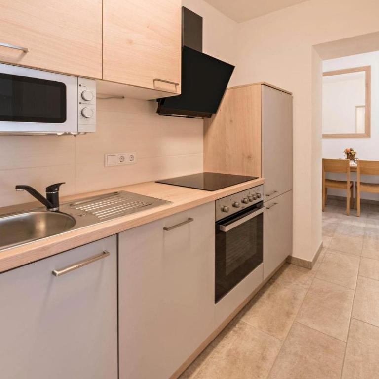 Mentenwirt Pension&Appartements - Apartment mit 2 Schlafzimmern und Gartenblick - 12