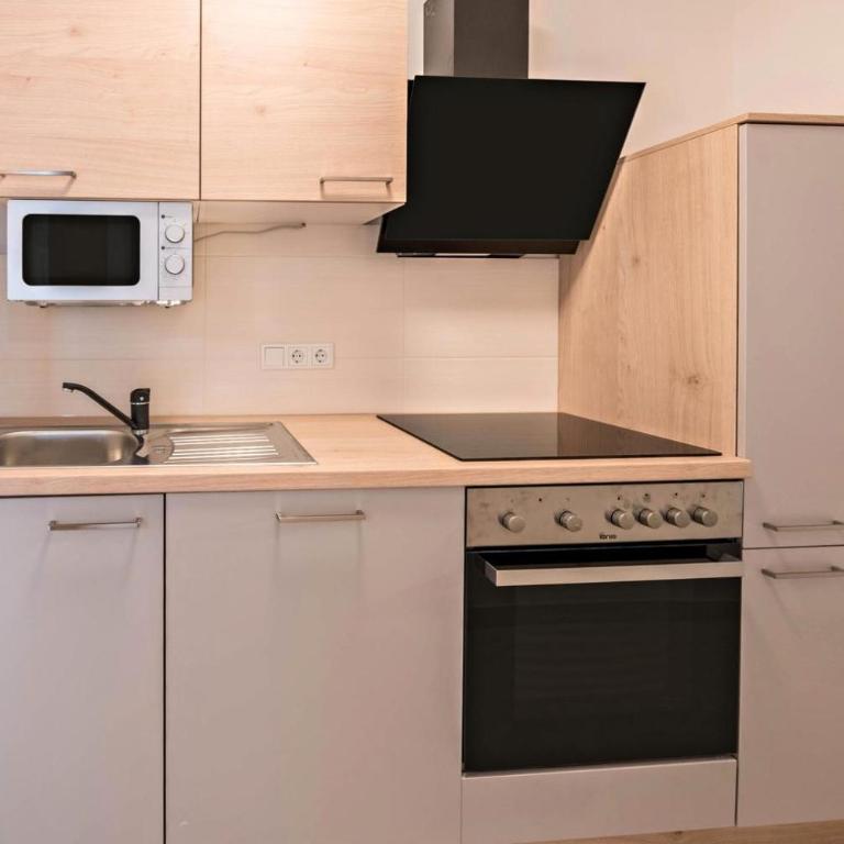 Mentenwirt Pension&Appartements - Apartment mit 2 Schlafzimmern und Gartenblick - 11