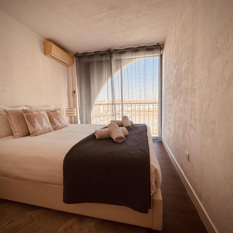 Hippopotame rose Duplex avec terrasse sur la Marina - Appartement 2 Chambres - Vue sur Eau - 9