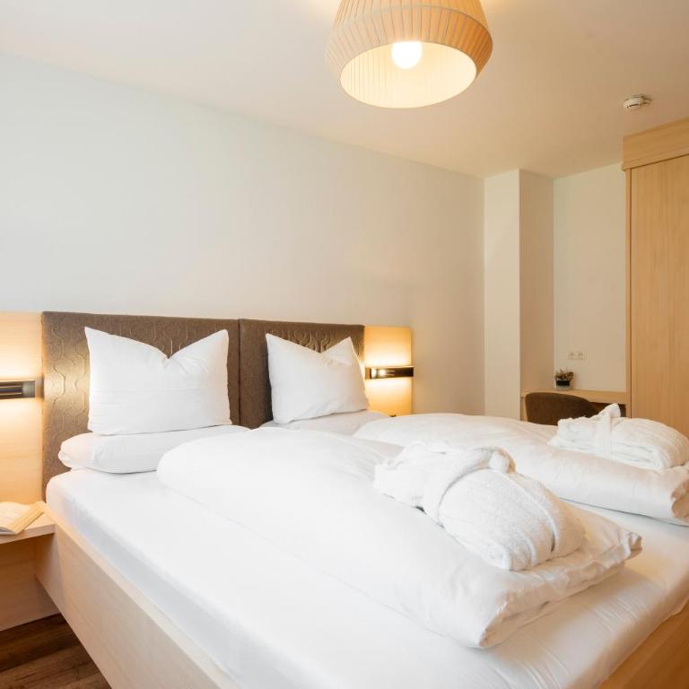 Aparthotel Saladina direkt an der Talstation - Deluxe Apartment mit Balkon und 2 Schlafzimmern - 11