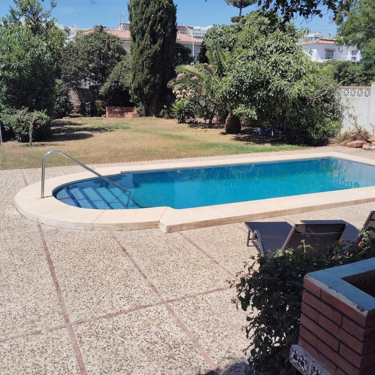 Amplia y acogedora casa con piscina, cerca de playa y puerto marina - One-Bedroom House - 11