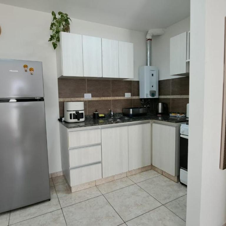 Dpto Nuevo Balcón con Asador Terraza propia con vista a sierras Cochera sin costo Pileta Seguridad 24 hs Av Colón Alberdi Ubicación estratégica H Clínicas Kempes Shopping Carlos Paz - Apartamento de 1 dormitorio - 17