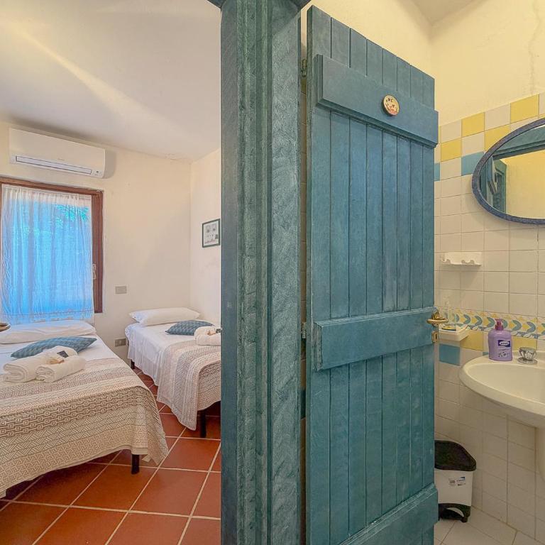 Exclusive Villa Overlooking La Pelosa Beach by Host Hero - Villa - 64