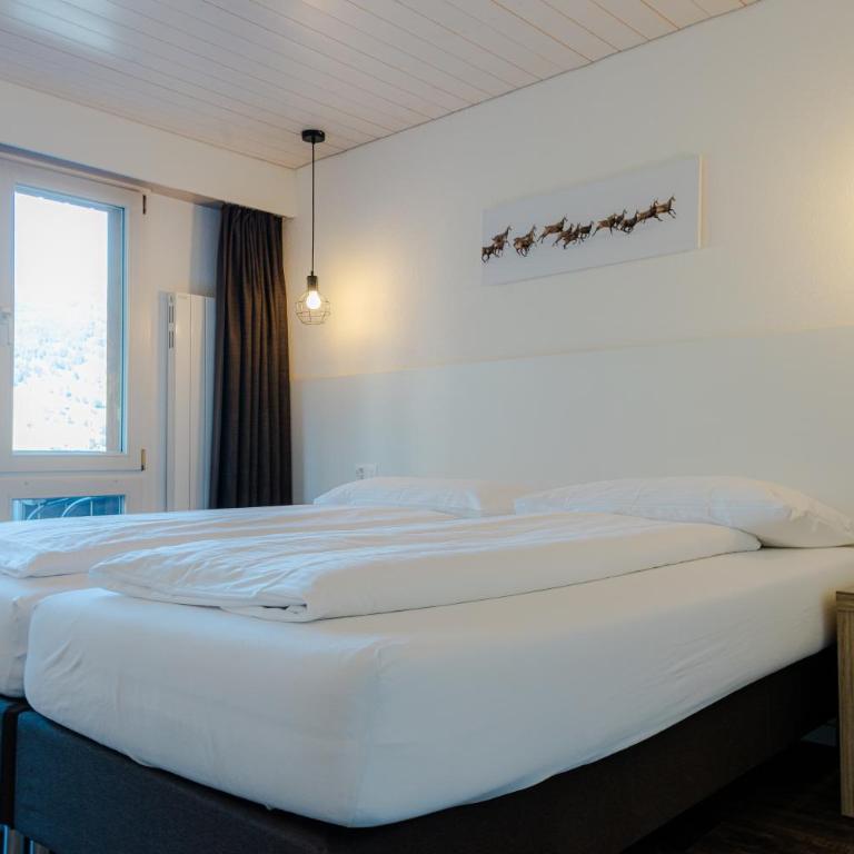 Jungfrau Lodge, Swiss Mountain Hotel - Doppel- oder Zweibettzimmer mit Eigerblick und Balkon - 5