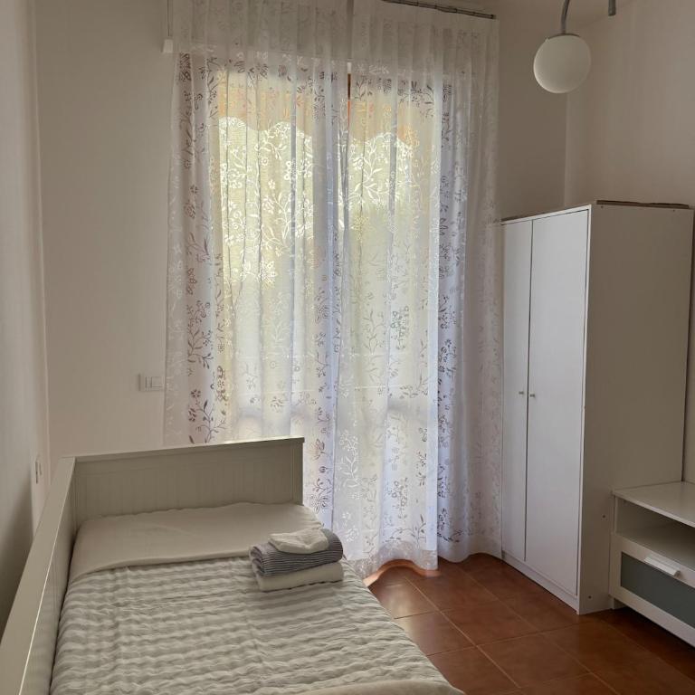 Appartamento al piano terra - 1,5km dal mare - Appartamento con 2 Camere da Letto e Balcone - 12