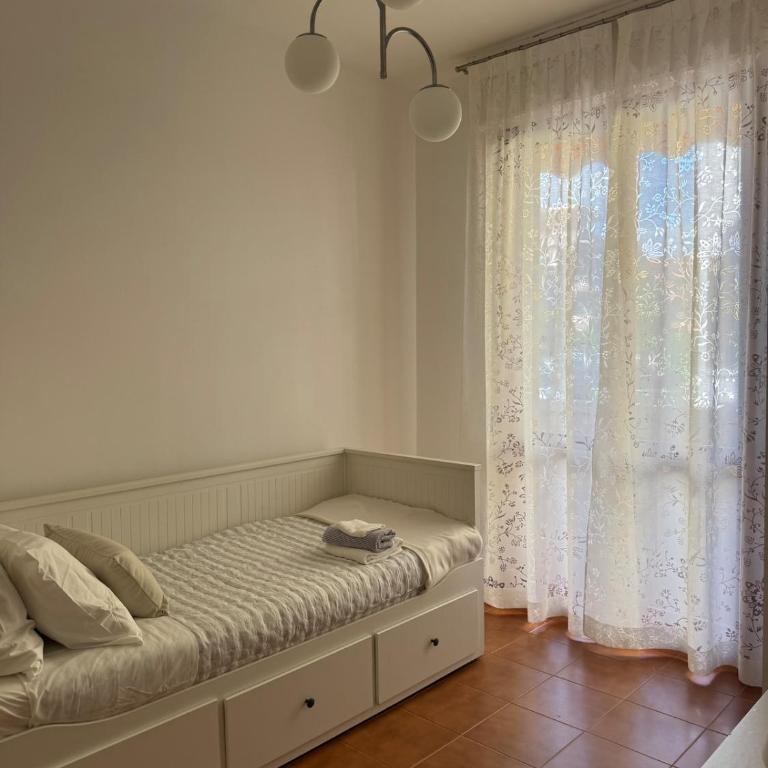 Appartamento al piano terra - 1,5km dal mare - Appartamento con 2 Camere da Letto e Balcone - 15
