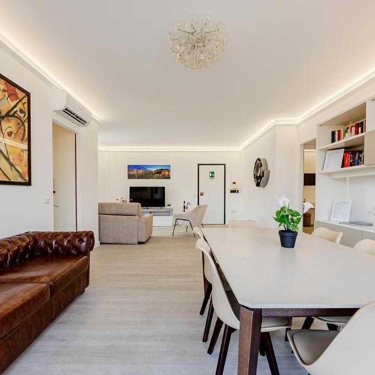 La Casa del Tomo - Metro A - Parcheggio Privato - 6 ospiti - Appartamento con 2 Camere da Letto - 86