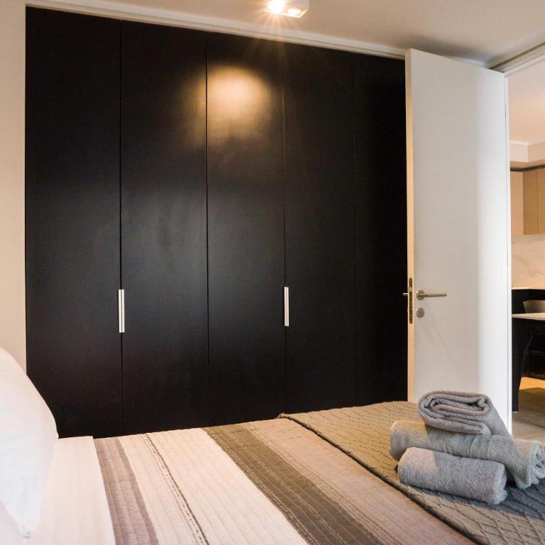 Modern 1BR Flat Prime Location Luxury Living - Apartamento - 9