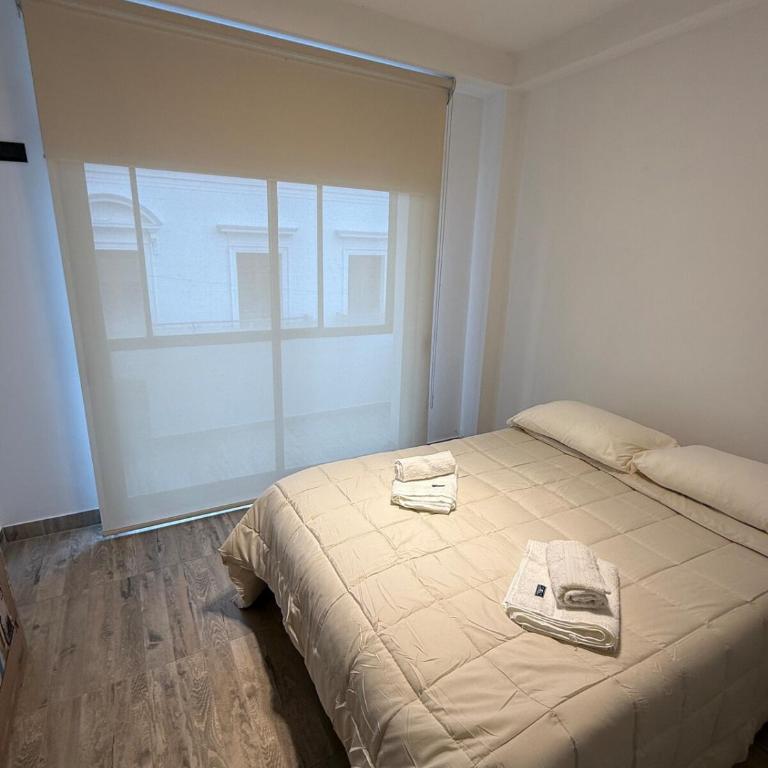 Departamento temporario frente museo de la virgen - Apartamento de 1 dormitorio - 1