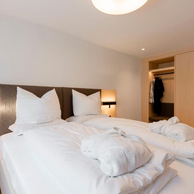 Aparthotel Saladina direkt an der Talstation - Apartment mit 1 Schlafzimmer, Balkon und Stadtblick - 1