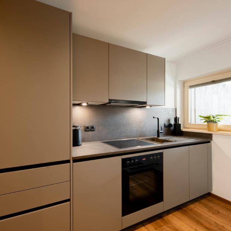 Aparthotel Saladina direkt an der Talstation - Apartment mit 1 Schlafzimmer, Balkon und Stadtblick - 9
