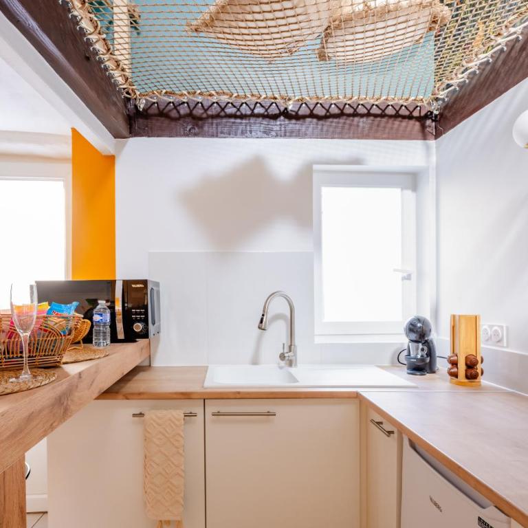 La Canopée - Idéal couples - Filet de catamaran suspendu - Balnéo - Maisonnette sur 2 étages de 45m2 - Clim réversible - Netflix - Wifi - Maison 1 Chambre - 7