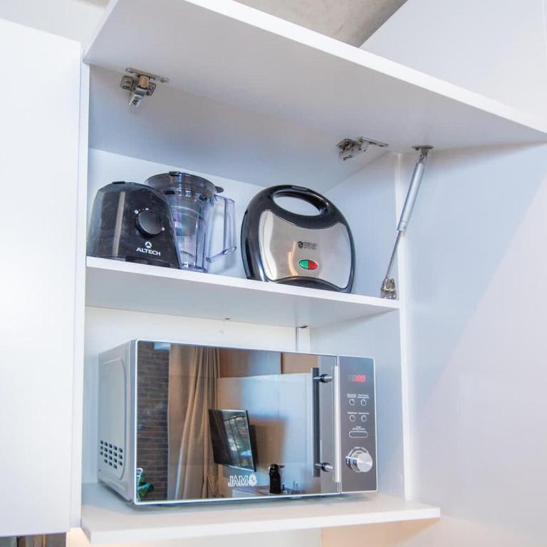 Business Hub Near Malls with Pool Gym and fast WiFi - Apartment - 13