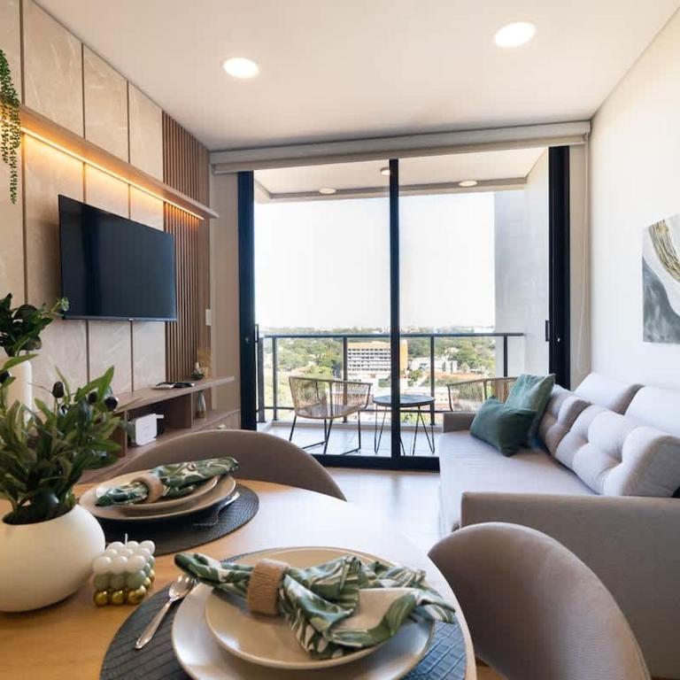 One-Bedroom with Balcony Near Malls Pool and City Views - Apartment - 9
