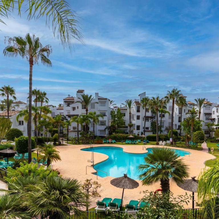 Costalita Beach Residence with Pool, Reserved Garage Parking & Direct Beach Access by Downtown Apartments Spain - Two-Bedroom Apartment with Pool View - 4