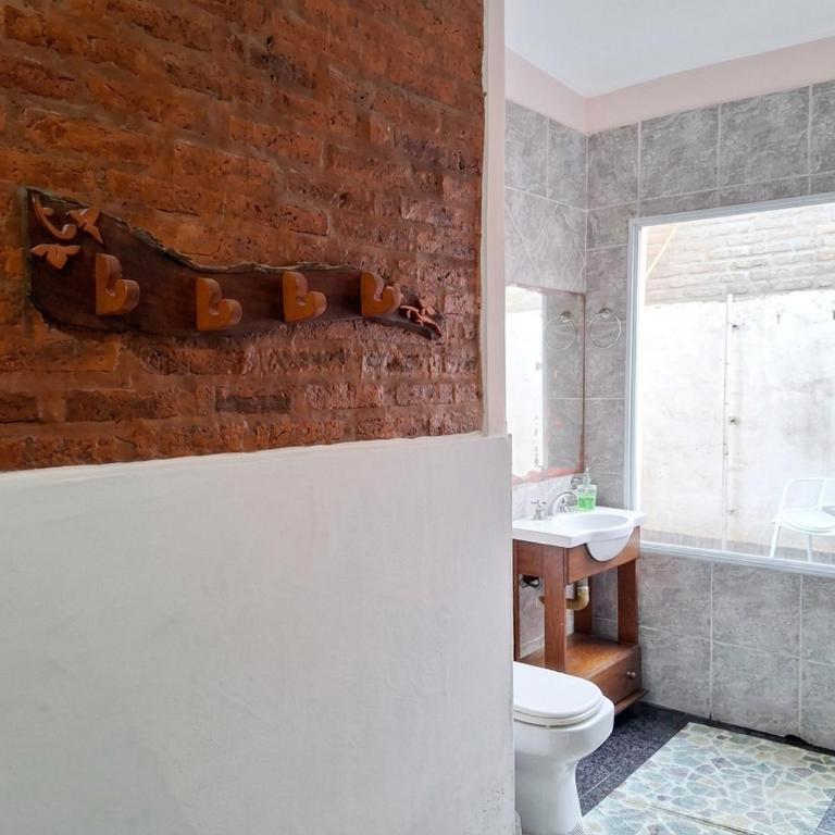 Monoambiente luminoso con hogar a leña - Cochera - Apartamento de 1 dormitorio - 12