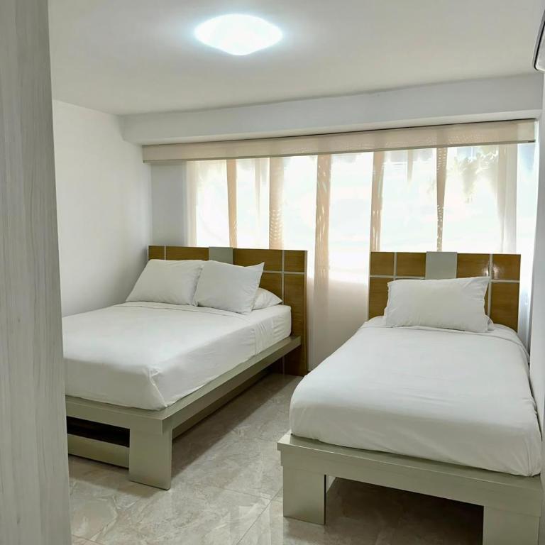Junto a la playa, moderno y acogedor apartamento - Three-Bedroom Apartment - 6