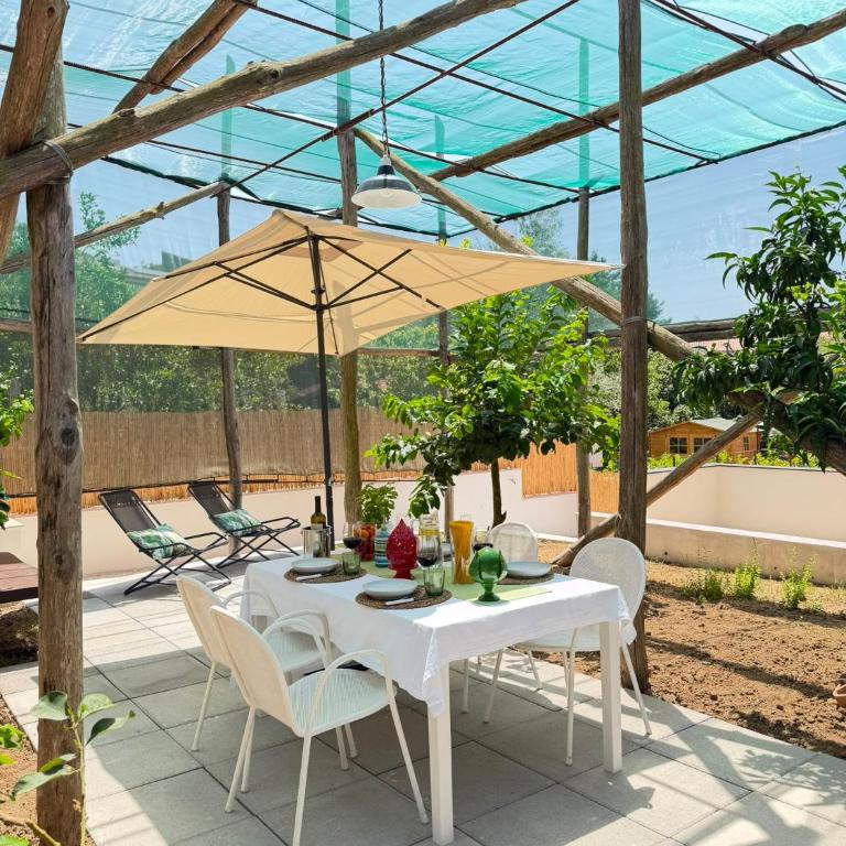 La camelia - Accogliente casa con giardino, aria condizionata, parcheggio gratuito, Wi-Fi - Casa con 2 Camere da Letto - 1