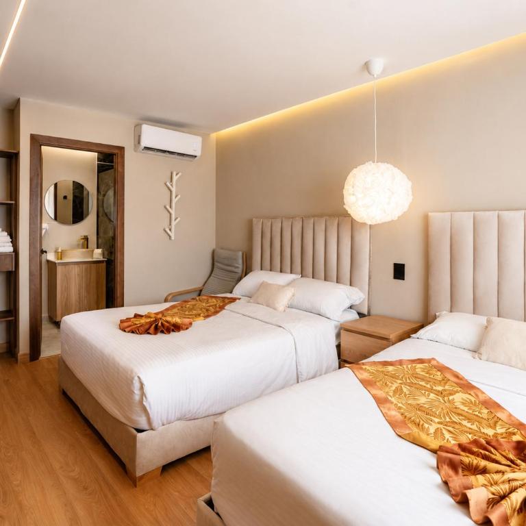 Recuerdos De Mi Tierra HOTEL Poblado Provenza Parque Lleras - Premium Quadruple Room - 2